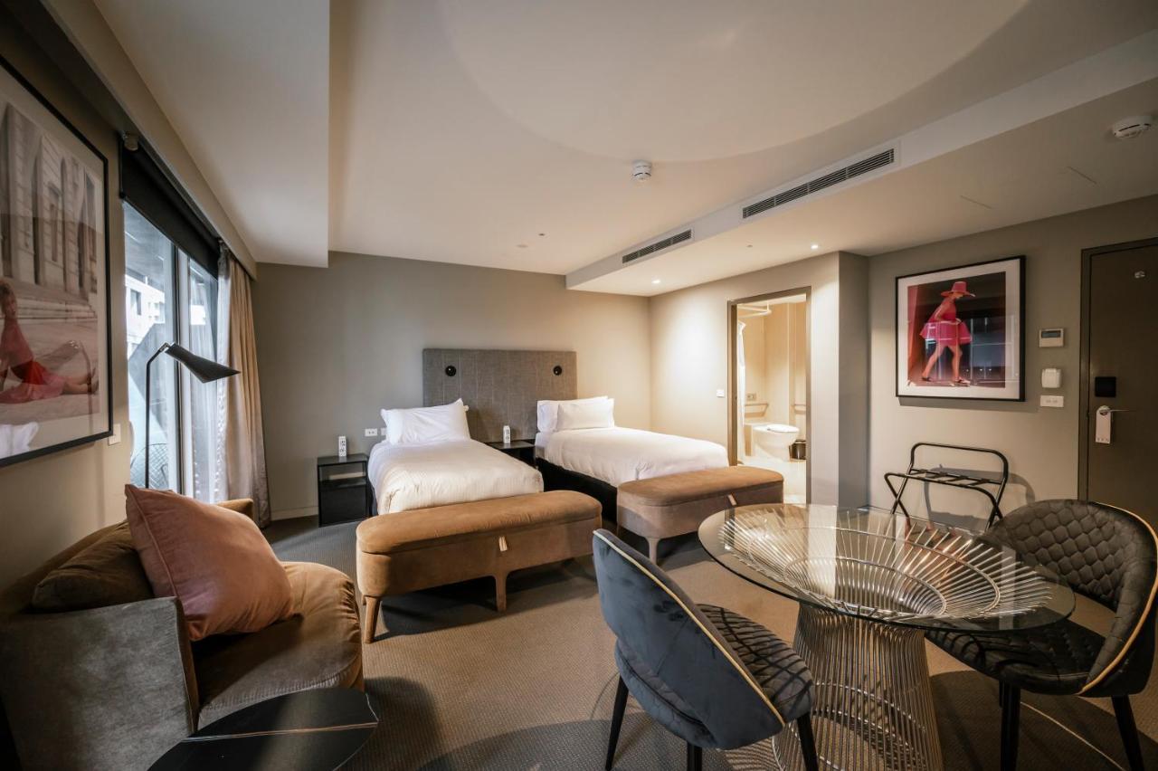 Hotel The Kinson à Ville de Ville de Melbourne Extérieur photo A suite at the hotel